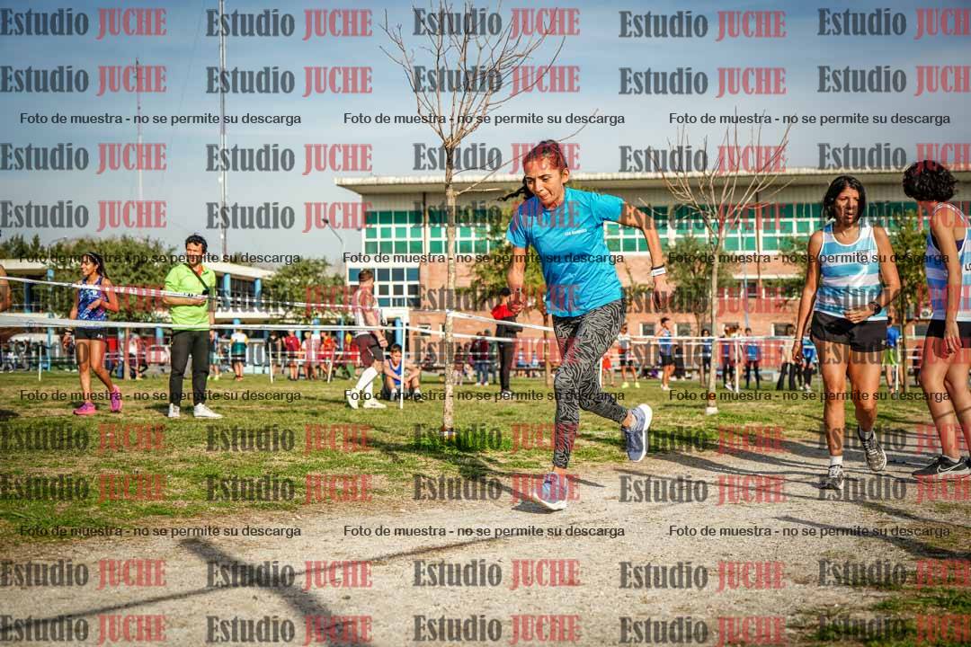 Fotos en el primer relevo (1000 m de carrera)