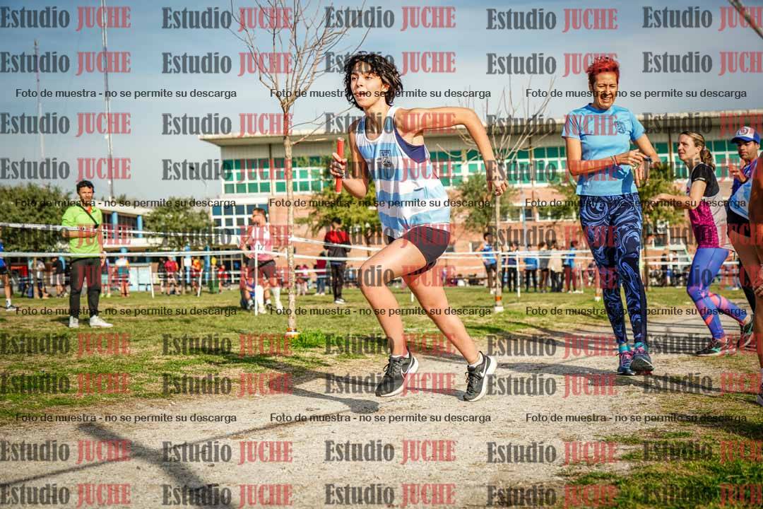 Fotos en el primer relevo (1000 m de carrera)