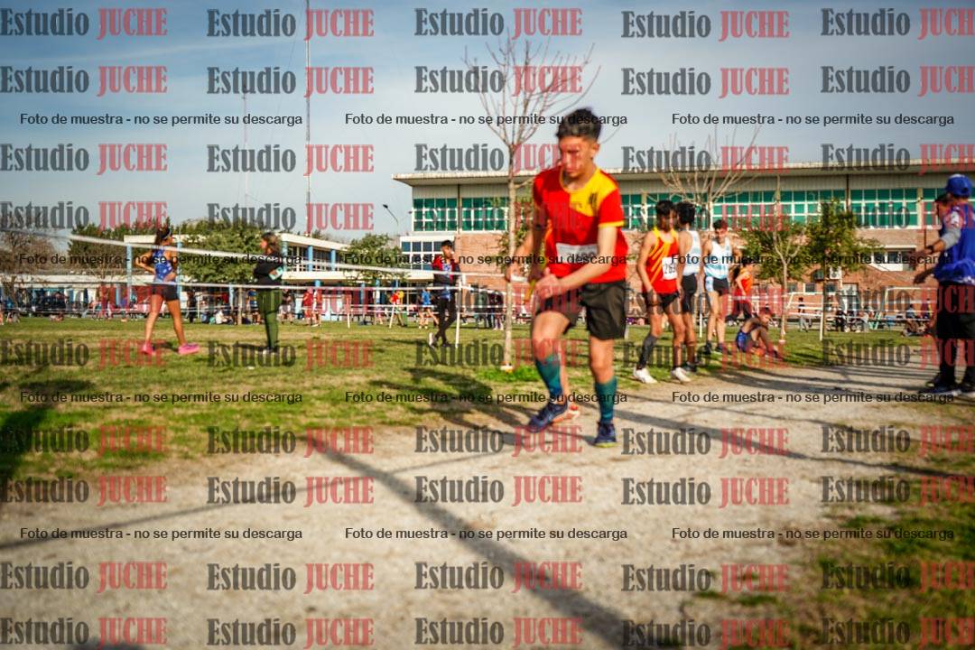 Fotos en el tercer relevo (3000 m de carrera)