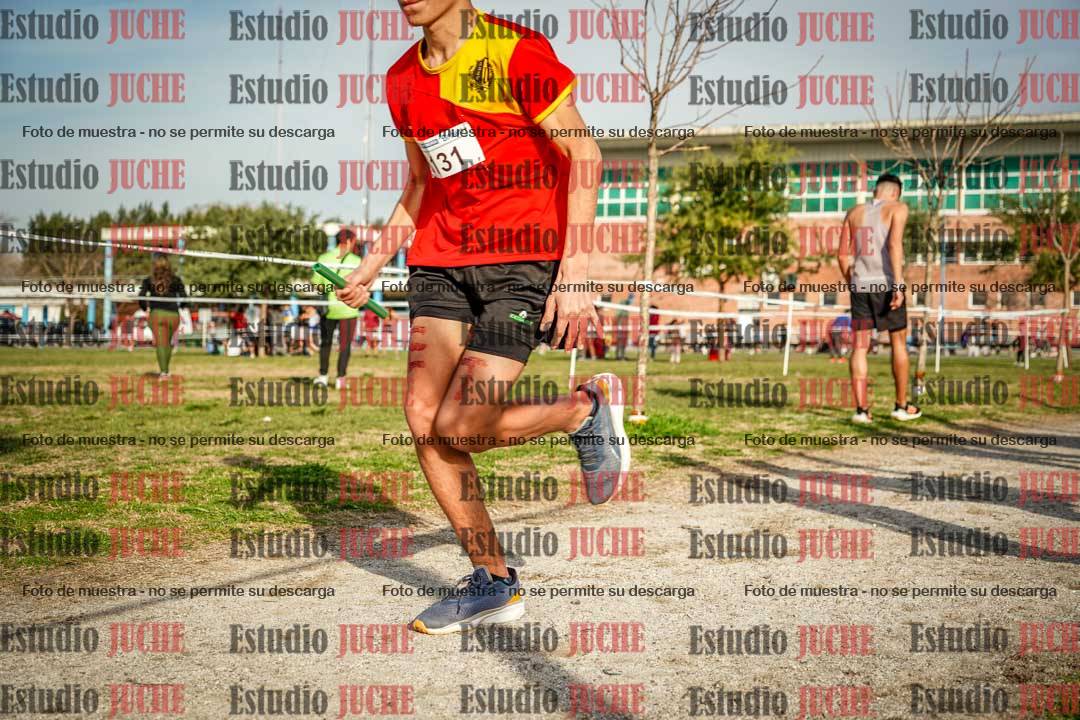 Fotos en el tercer relevo (3000 m de carrera)