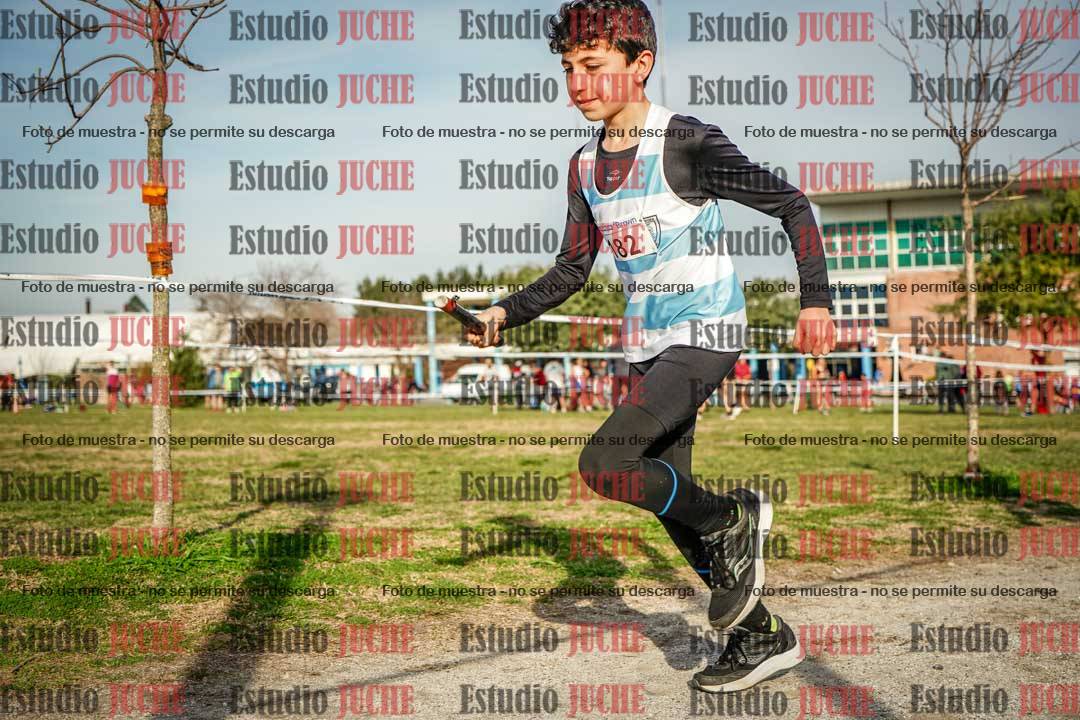 Fotos en el tercer relevo (3000 m de carrera)