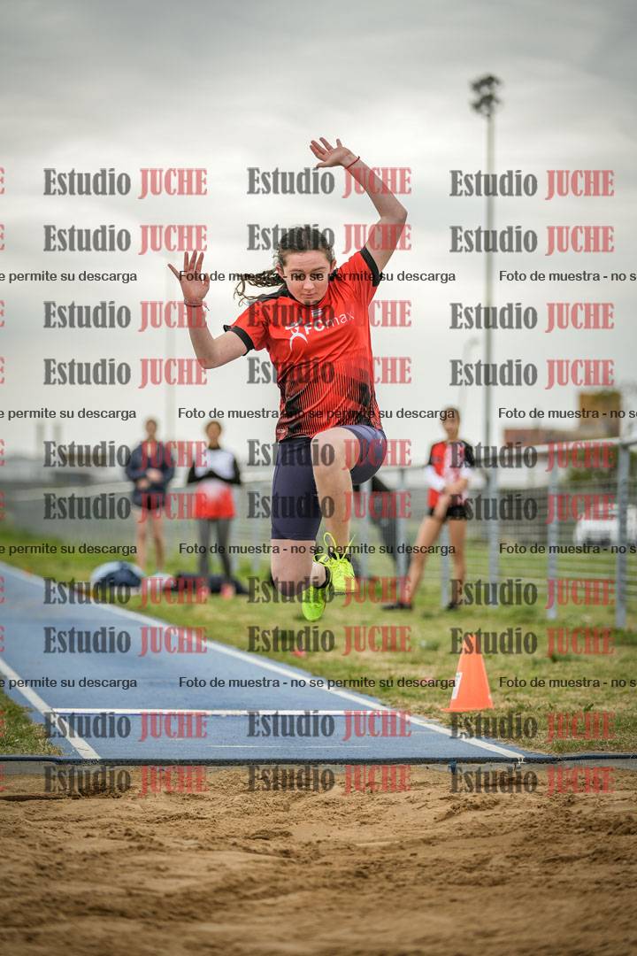 Fotos del salto en largo de mujeres - ambas categorías