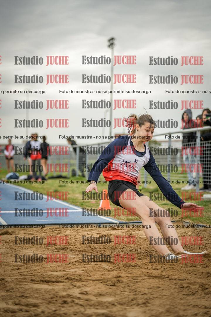 Fotos del salto en largo de mujeres - ambas categorías