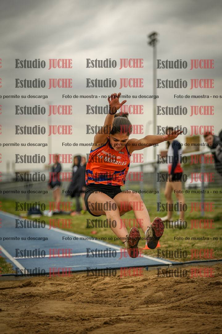 Fotos del salto en largo de mujeres - ambas categorías