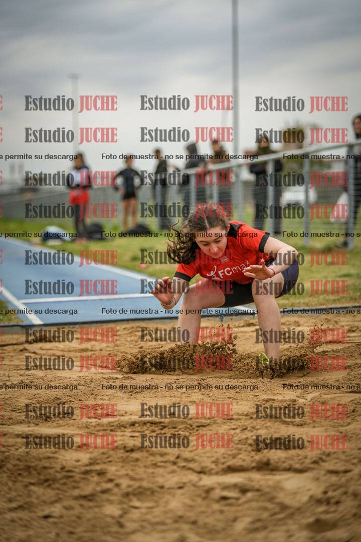 Fotos del salto en largo de mujeres - ambas categorías