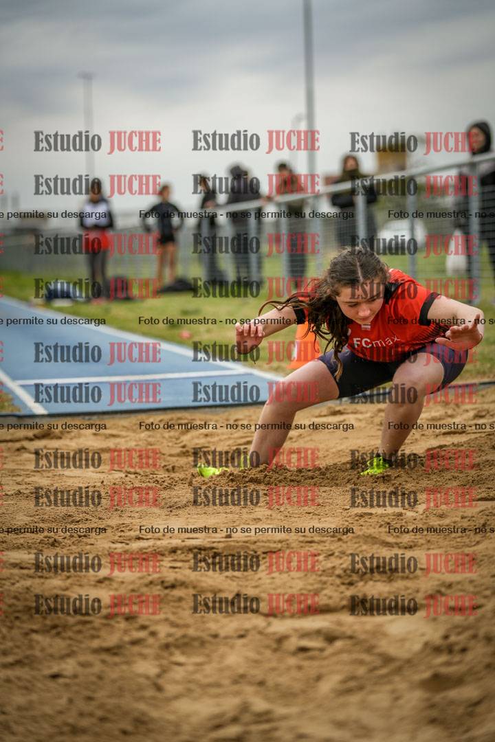 Fotos del salto en largo de mujeres - ambas categorías