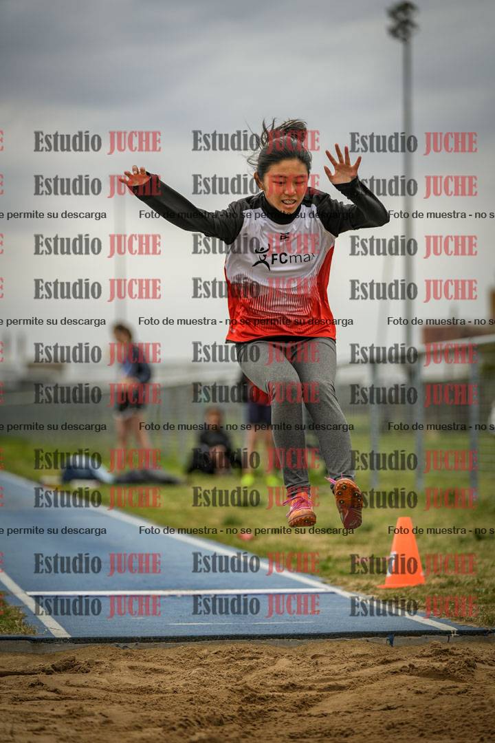 Fotos del salto en largo de mujeres - ambas categorías