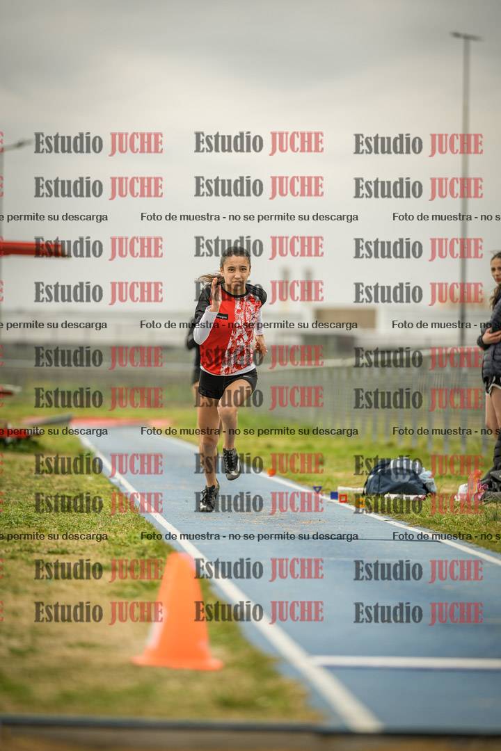 Fotos del salto en largo de mujeres - ambas categorías