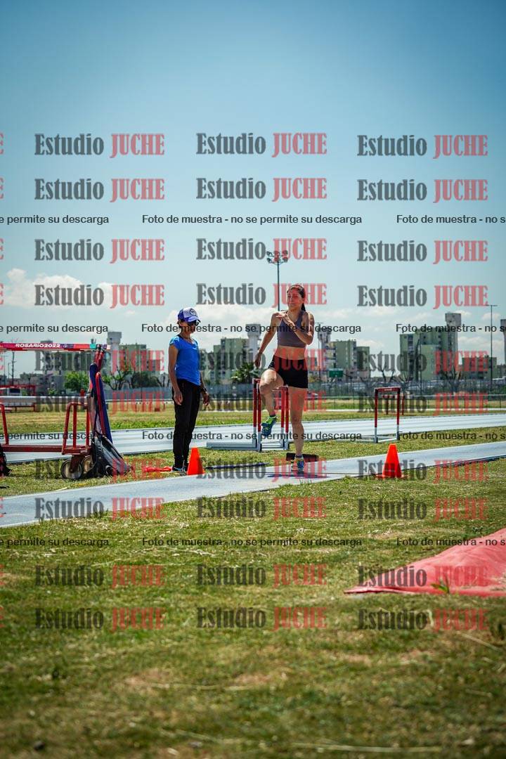 Fotos del salto triple de mujeres y varones - todas las tablas