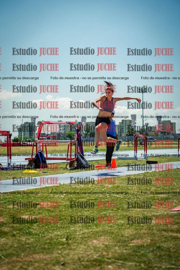 Fotos del salto triple de mujeres y varones - todas las tablas