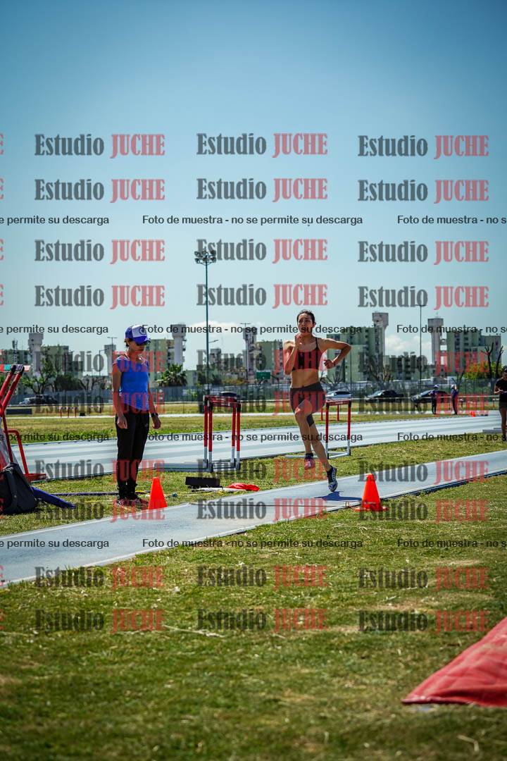Fotos del salto triple de mujeres y varones - todas las tablas