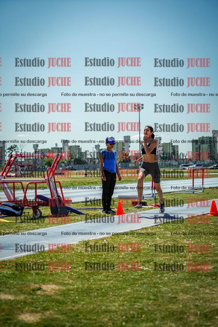Fotos del salto triple de mujeres y varones - todas las tablas