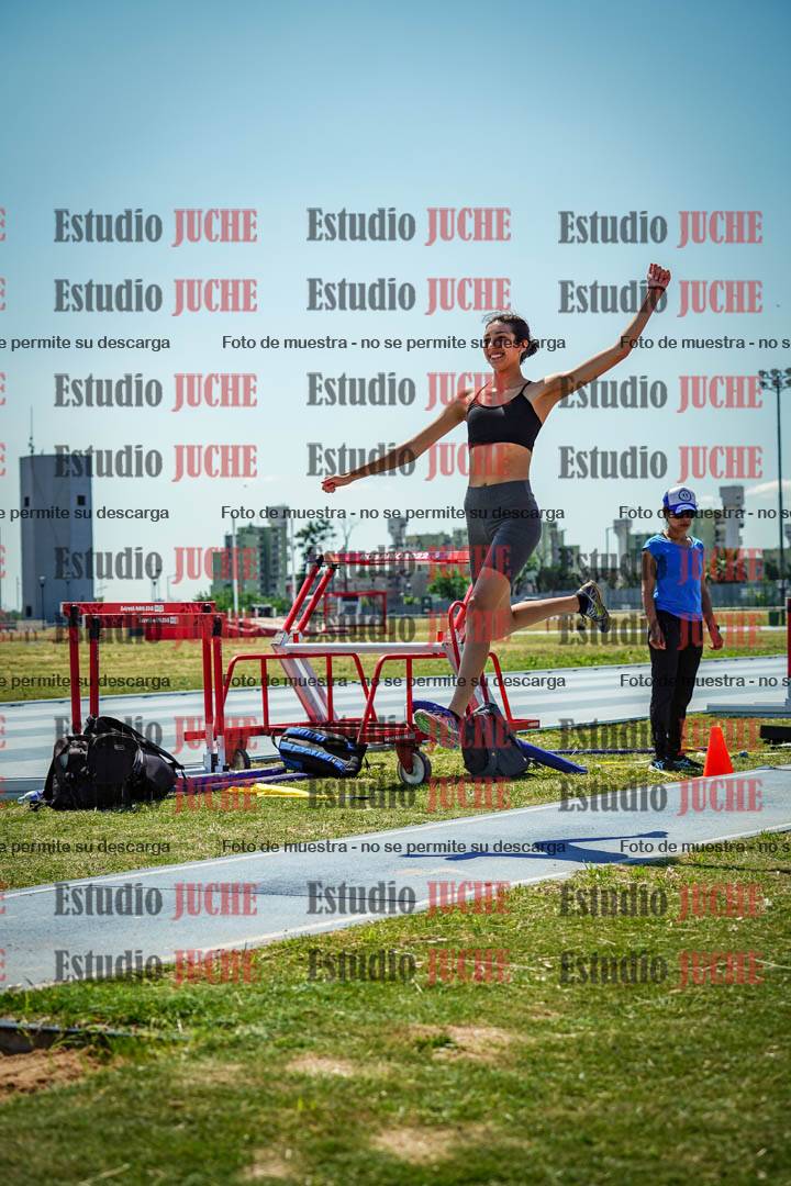 Fotos del salto triple de mujeres y varones - todas las tablas