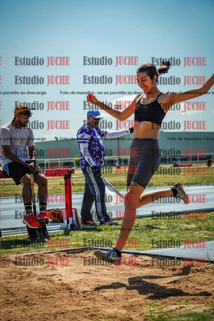 Fotos del salto triple de mujeres y varones - todas las tablas