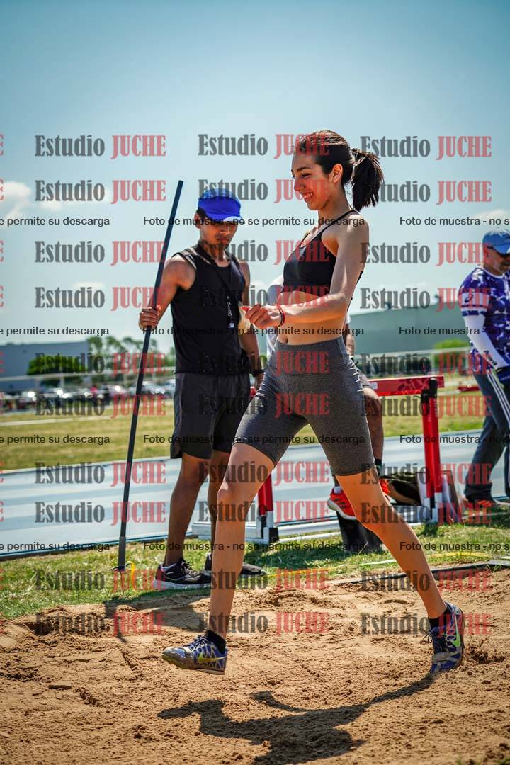 Fotos del salto triple de mujeres y varones - todas las tablas