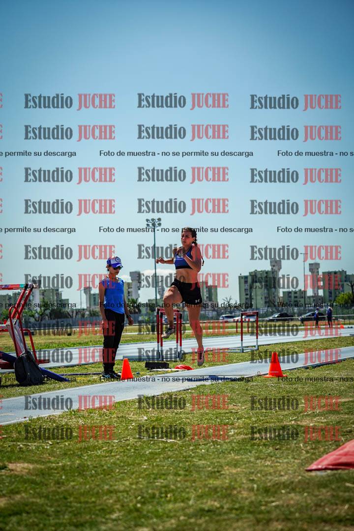 Fotos del salto triple de mujeres y varones - todas las tablas
