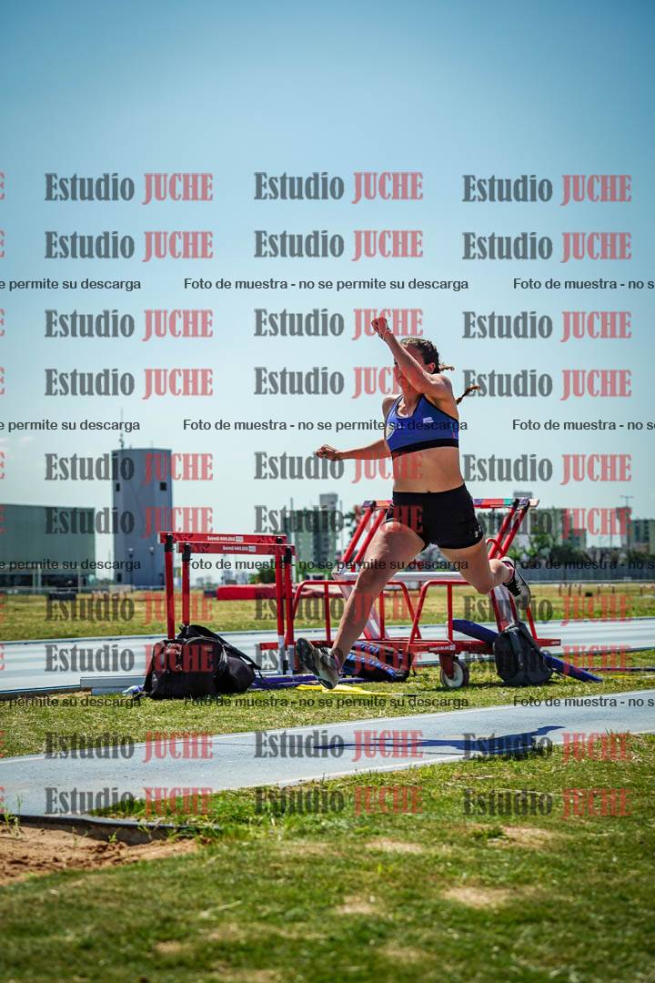 Fotos del salto triple de mujeres y varones - todas las tablas