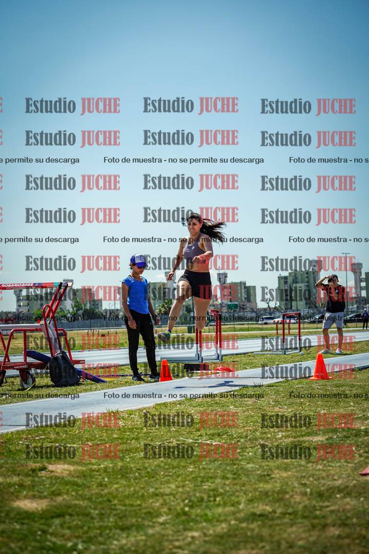 Fotos del salto triple de mujeres y varones - todas las tablas