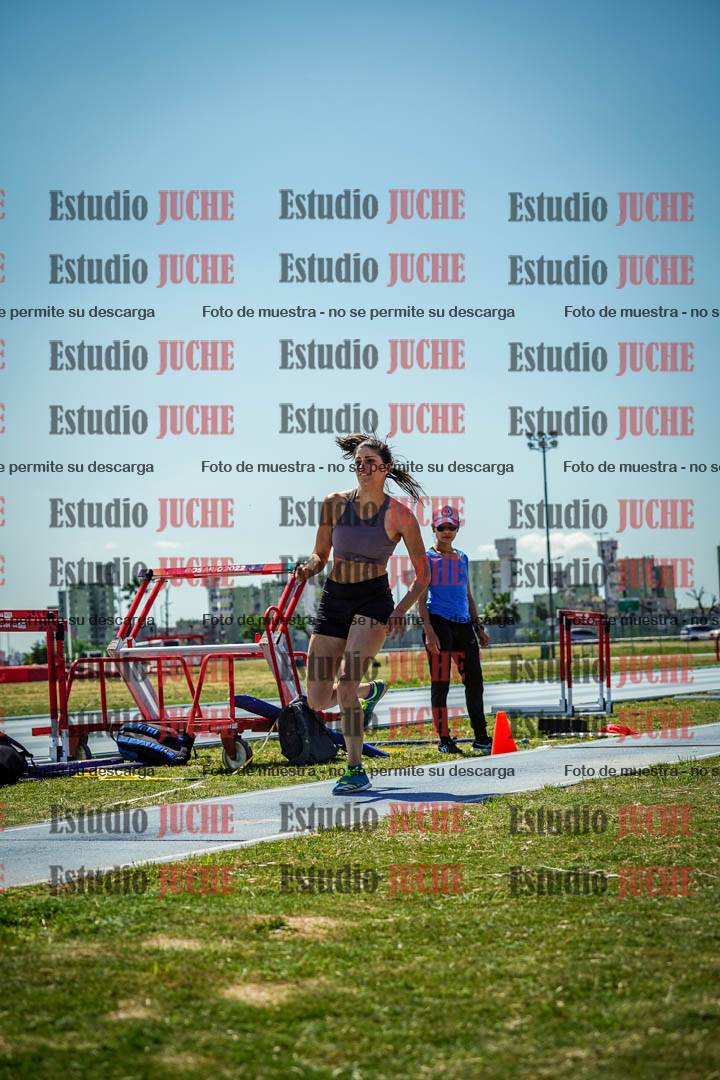 Fotos del salto triple de mujeres y varones - todas las tablas