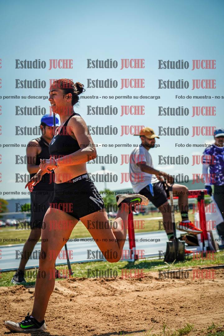 Fotos del salto triple de mujeres y varones - todas las tablas