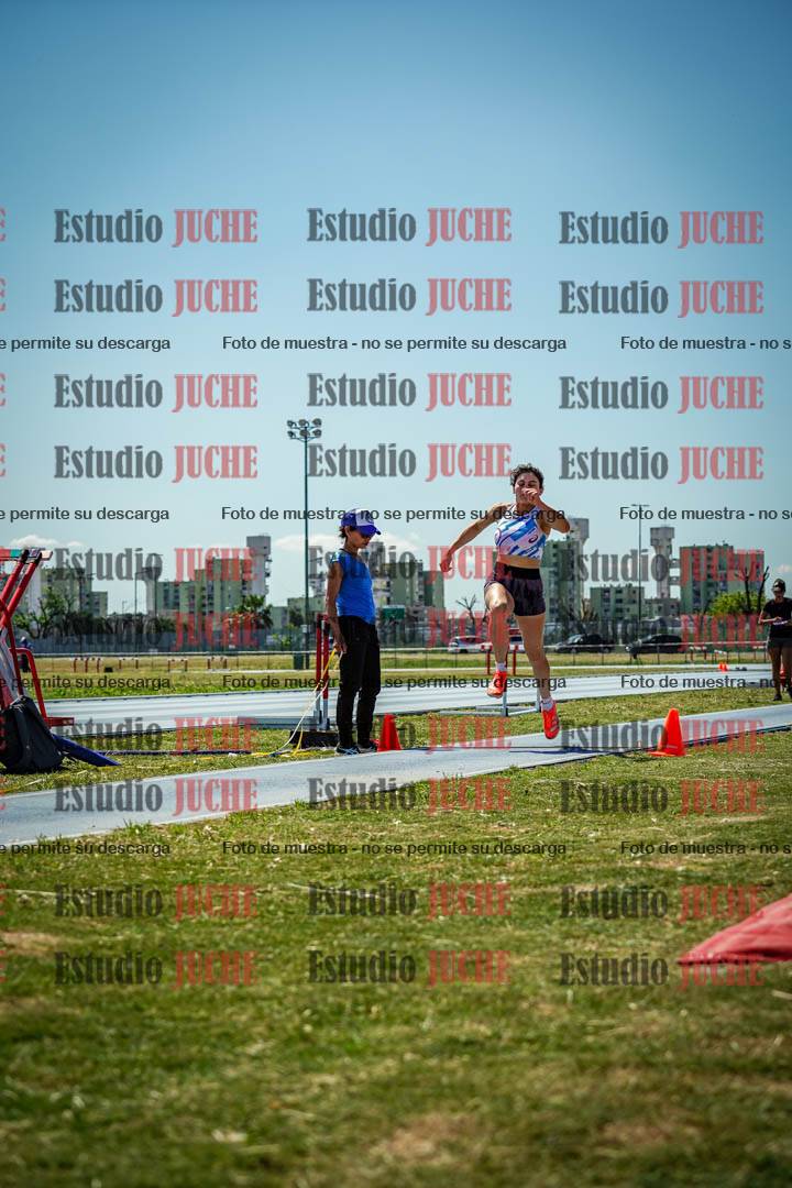 Fotos del salto triple de mujeres y varones - todas las tablas