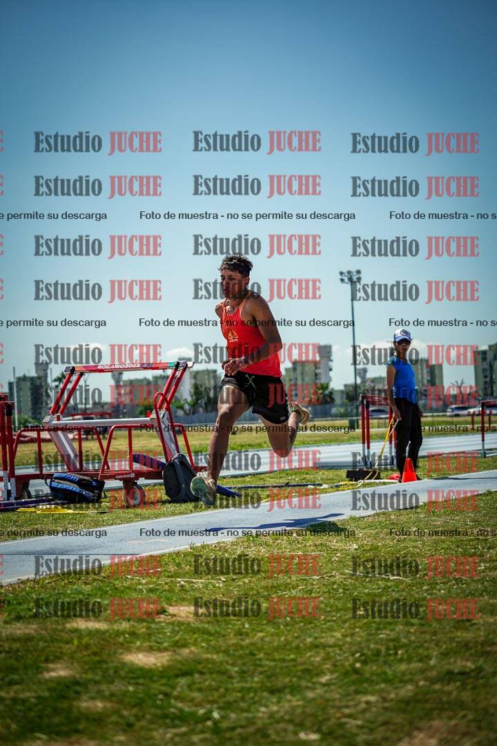 Fotos del salto triple de mujeres y varones - todas las tablas