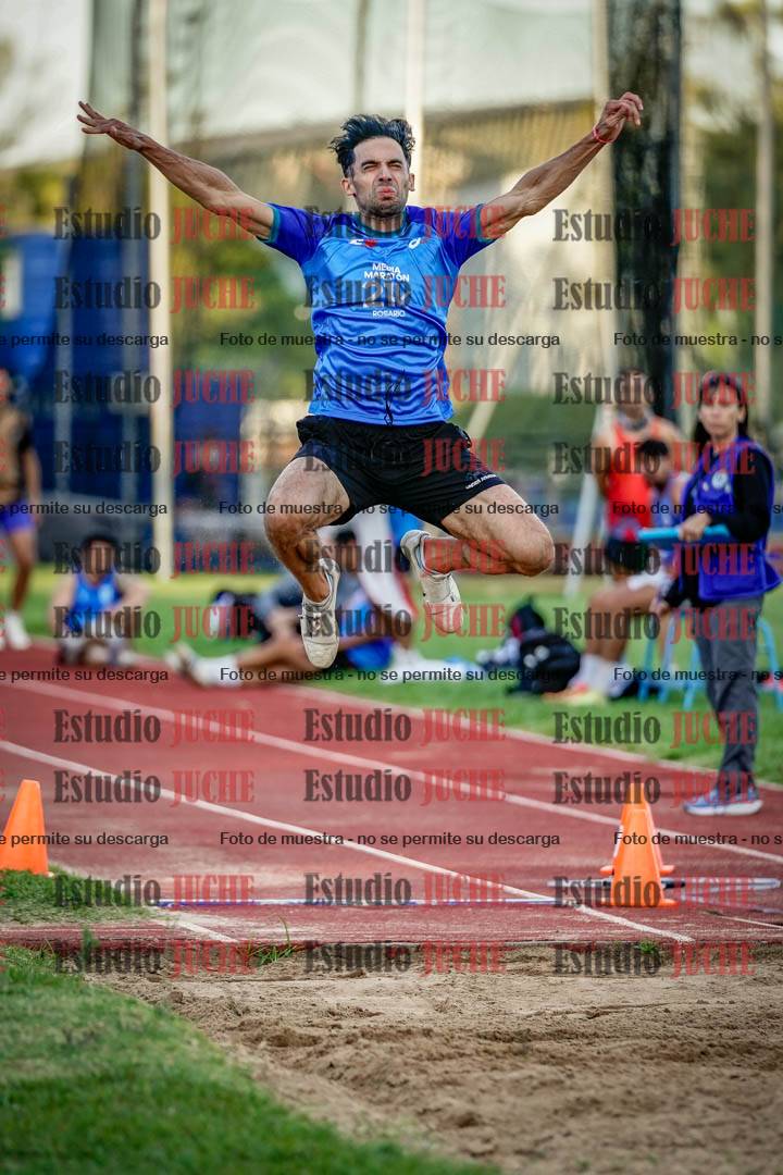 Fotos del salto en largo de varones