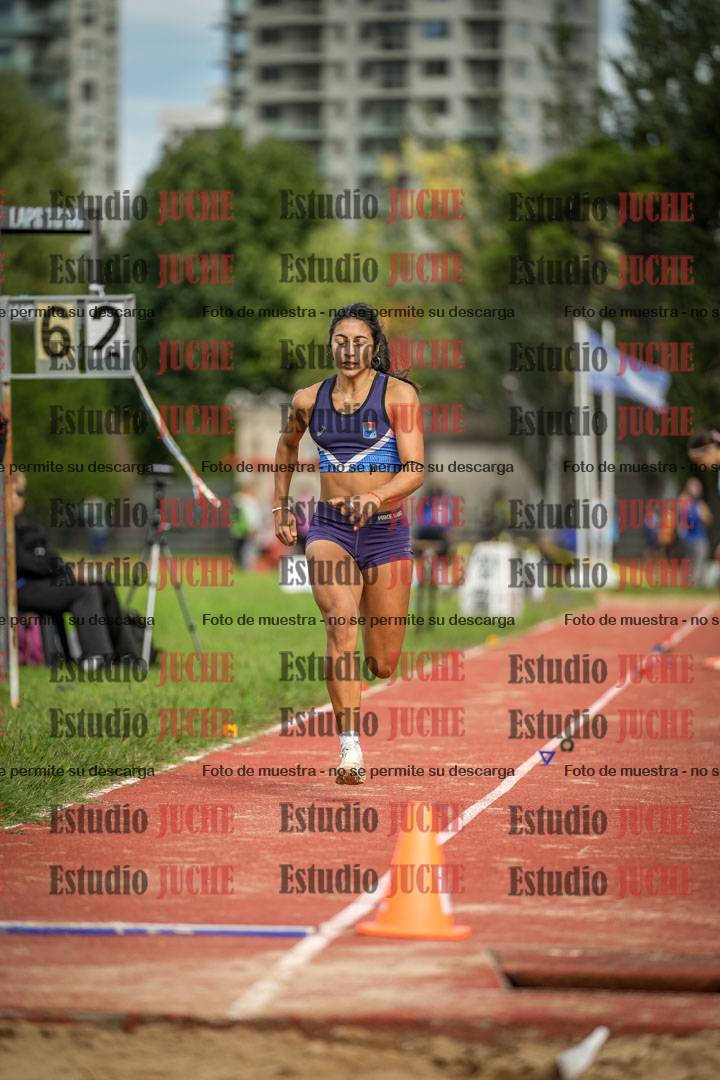 Fotos del salto en largo - mujeres mayores