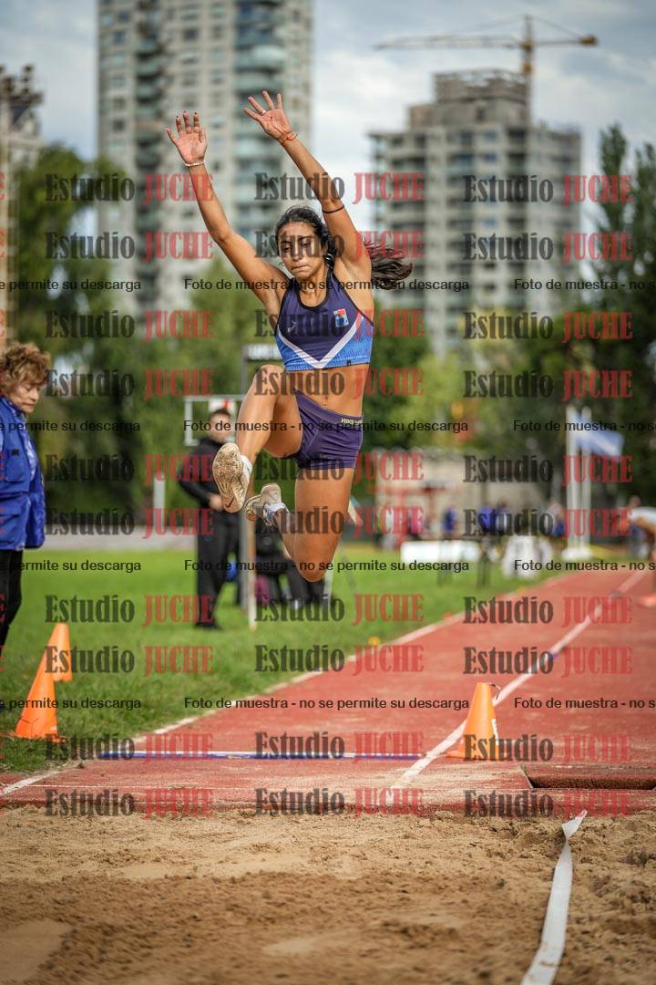 Fotos del salto en largo - mujeres mayores