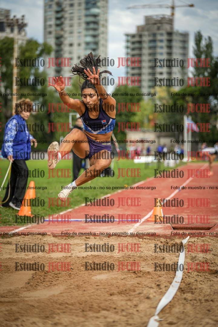 Fotos del salto en largo - mujeres mayores