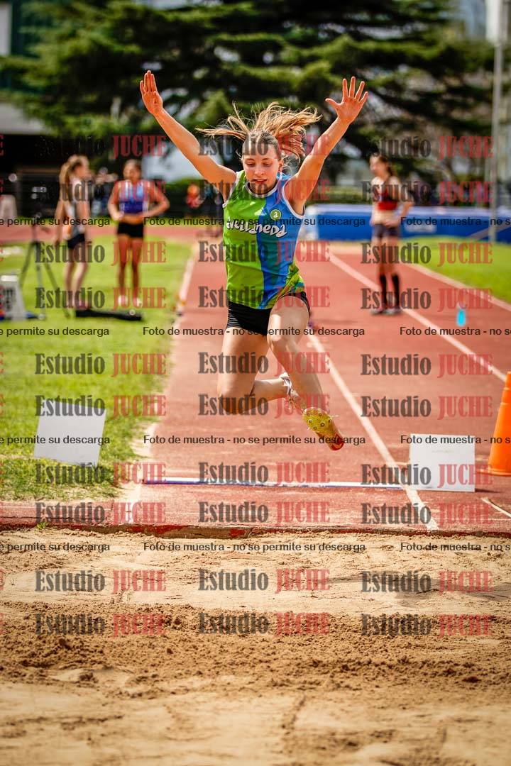 Fotos del salto en largo de mujeres