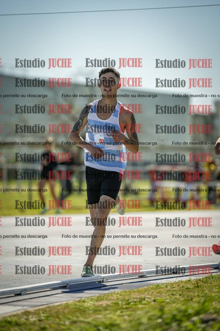 Fotos de los 5000 m llanos de mujeres y varones