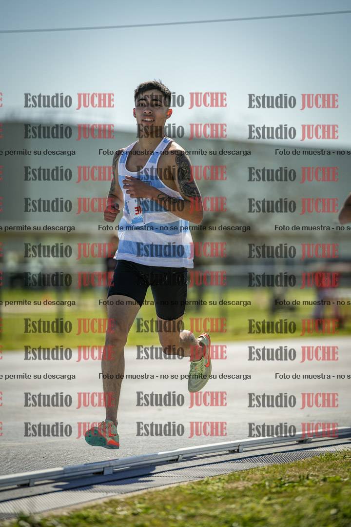 Fotos de los 5000 m llanos de mujeres y varones