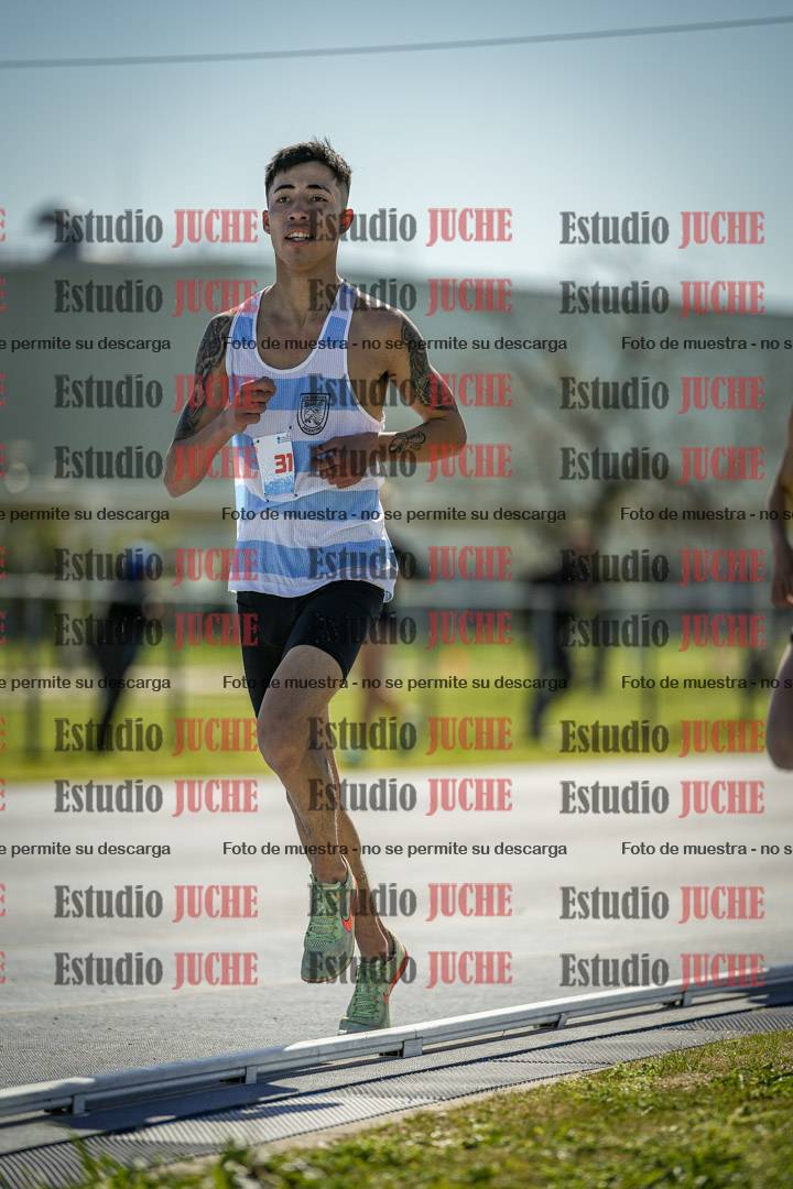 Fotos de los 5000 m llanos de mujeres y varones