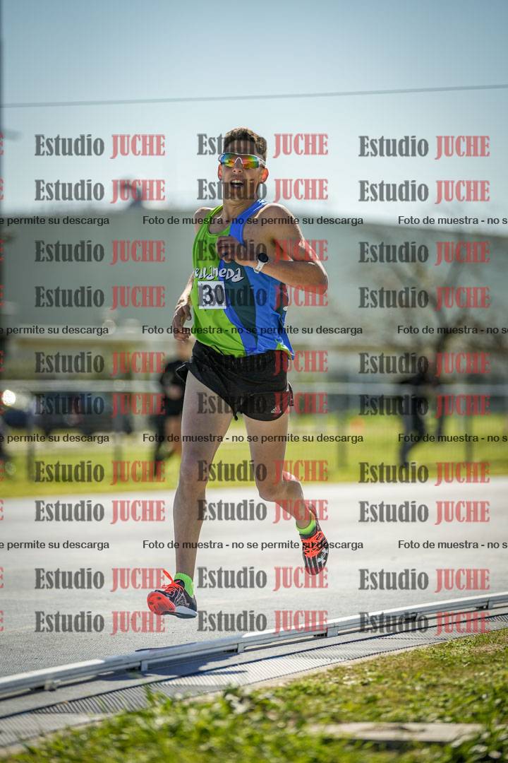 Fotos de los 5000 m llanos de mujeres y varones