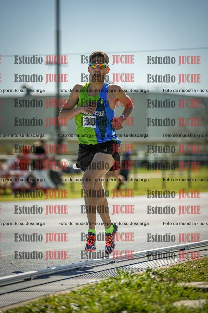Fotos de los 5000 m llanos de mujeres y varones