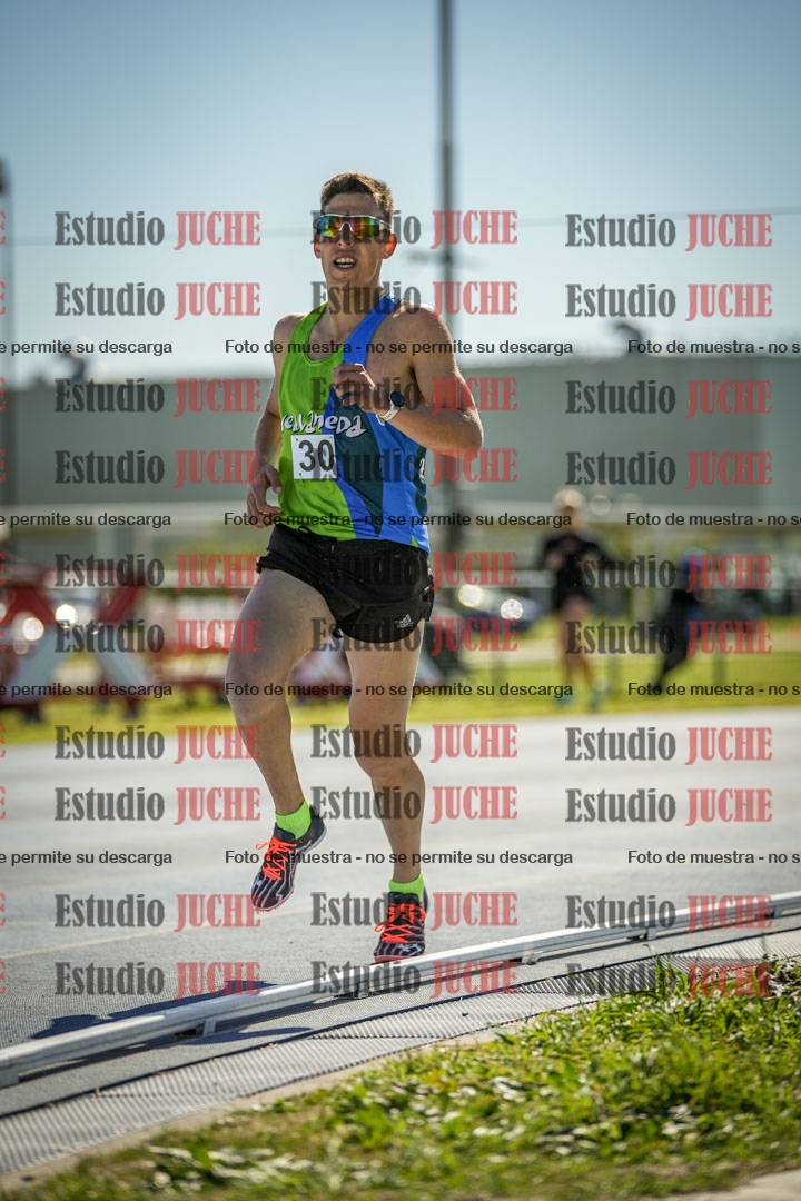 Fotos de los 5000 m llanos de mujeres y varones