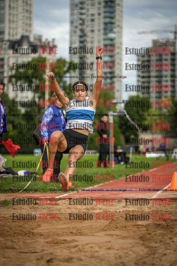Fotos del salto en largo - mujeres mayores
