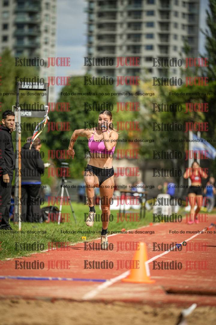 Fotos del salto en largo - mujeres mayores