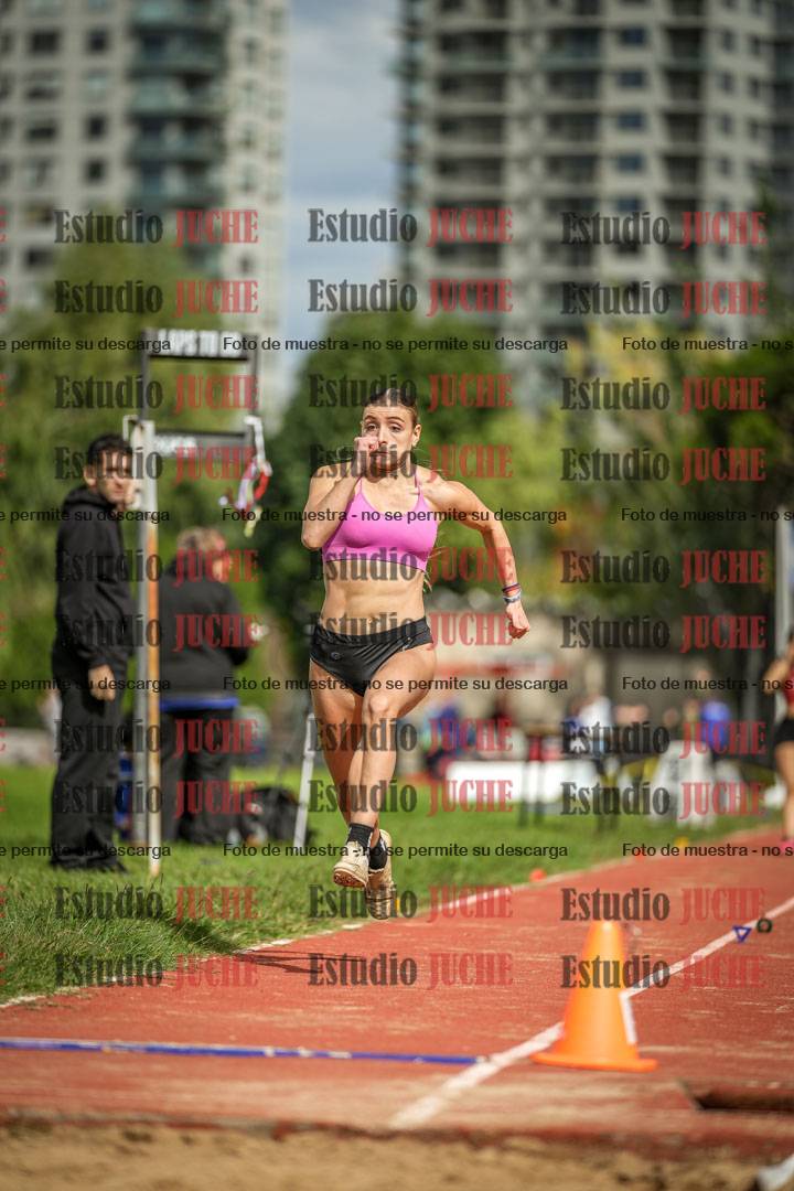 Fotos del salto en largo - mujeres mayores