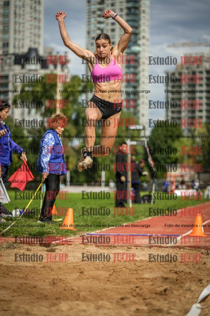 Fotos del salto en largo - mujeres mayores