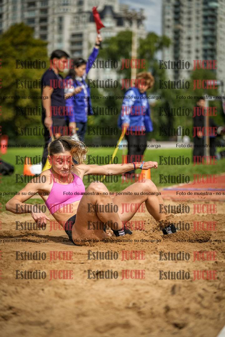 Fotos del salto en largo - mujeres mayores