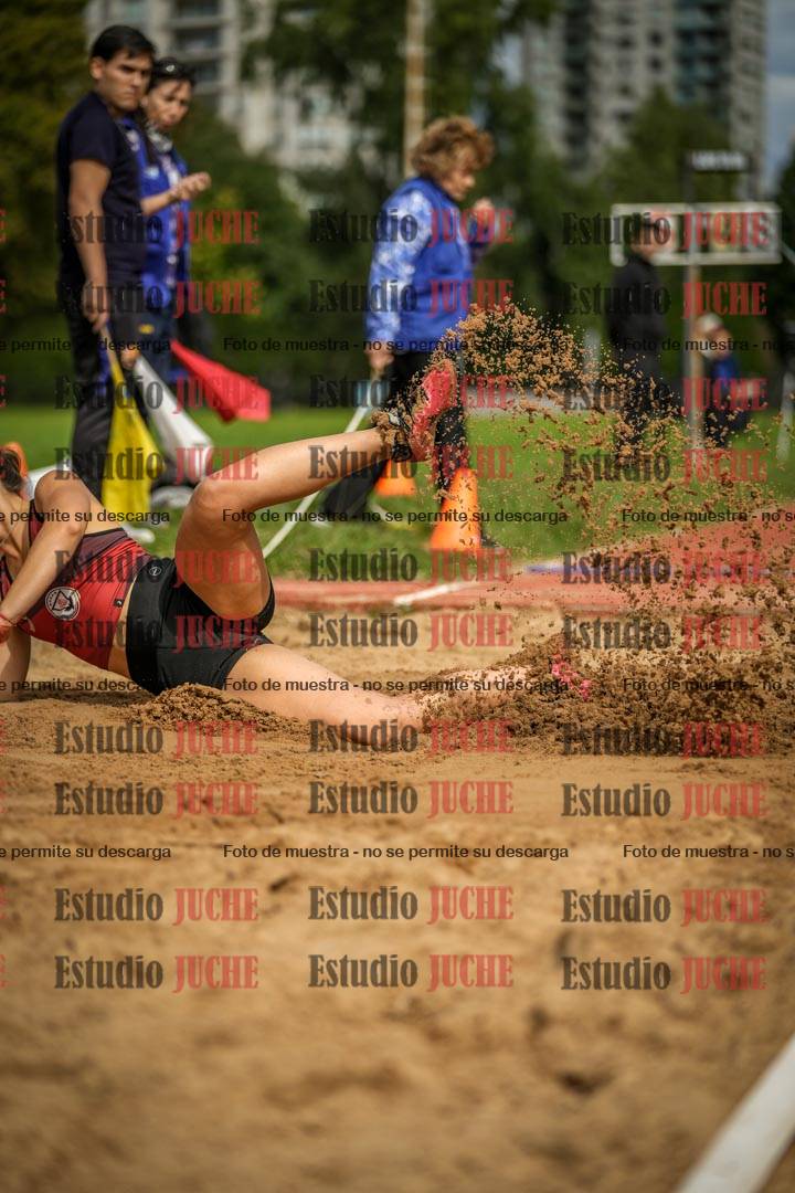Fotos del salto en largo - mujeres mayores