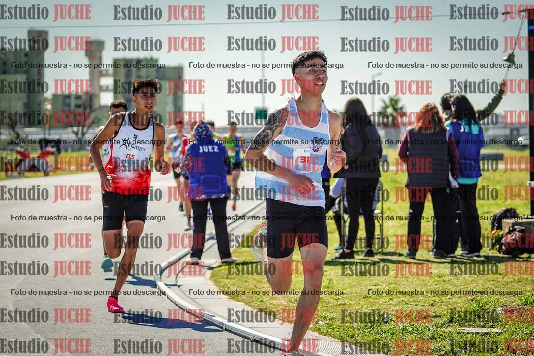 Fotos de los 5000 m llanos de mujeres y varones