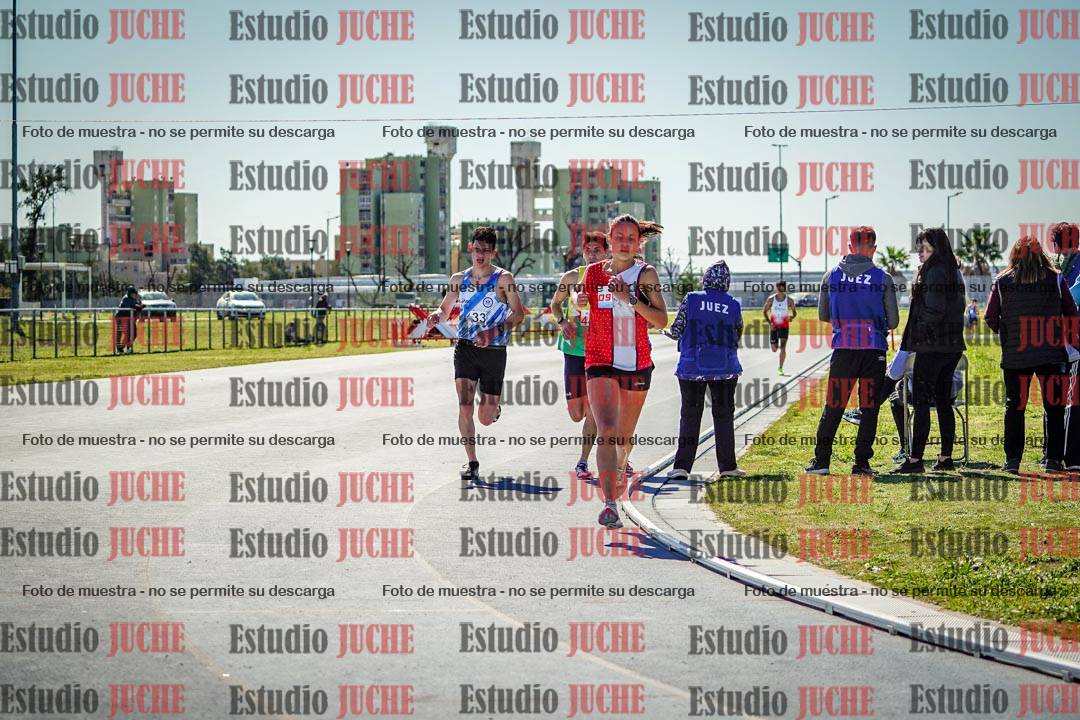 Fotos de los 5000 m llanos de mujeres y varones