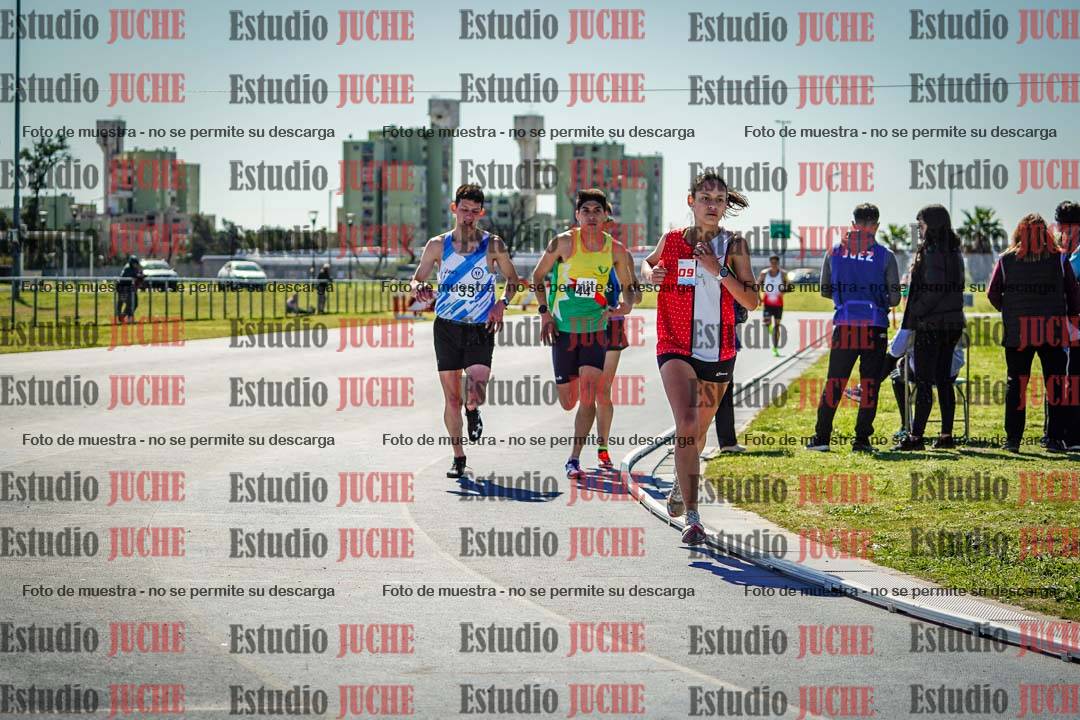 Fotos de los 5000 m llanos de mujeres y varones