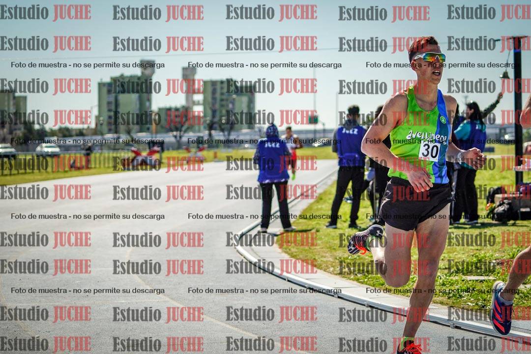 Fotos de los 5000 m llanos de mujeres y varones