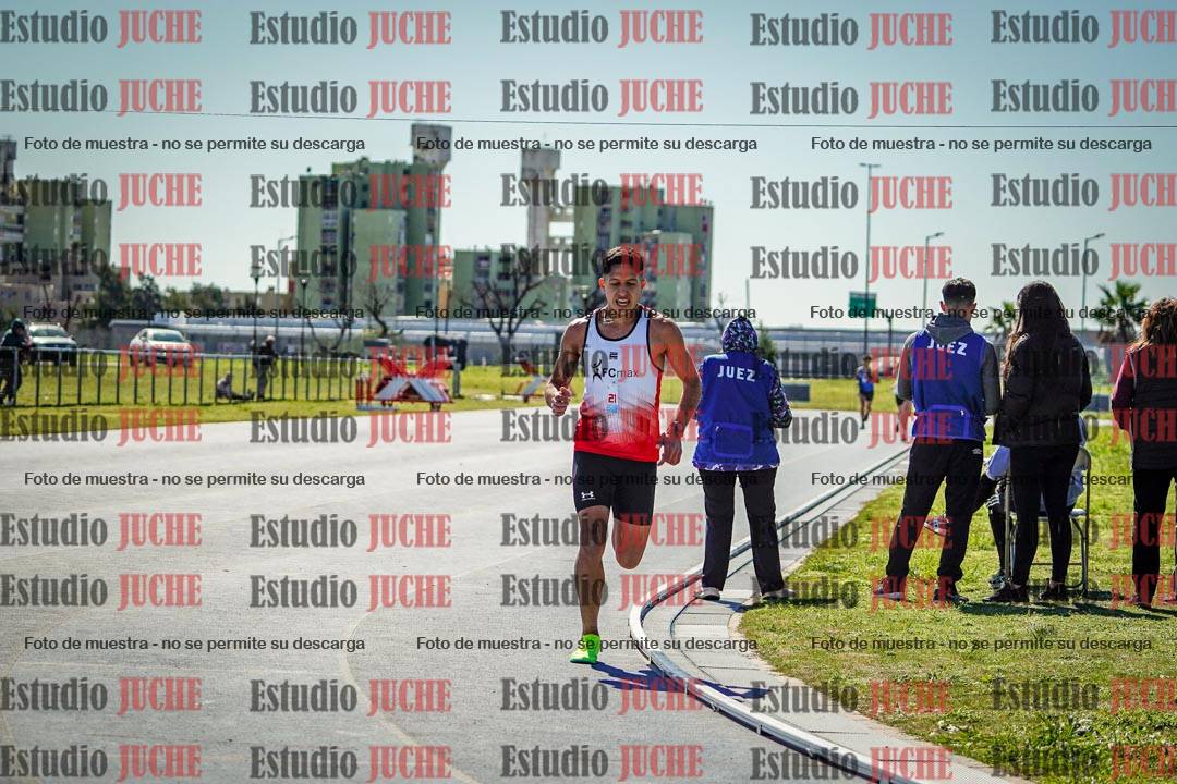 Fotos de los 5000 m llanos de mujeres y varones