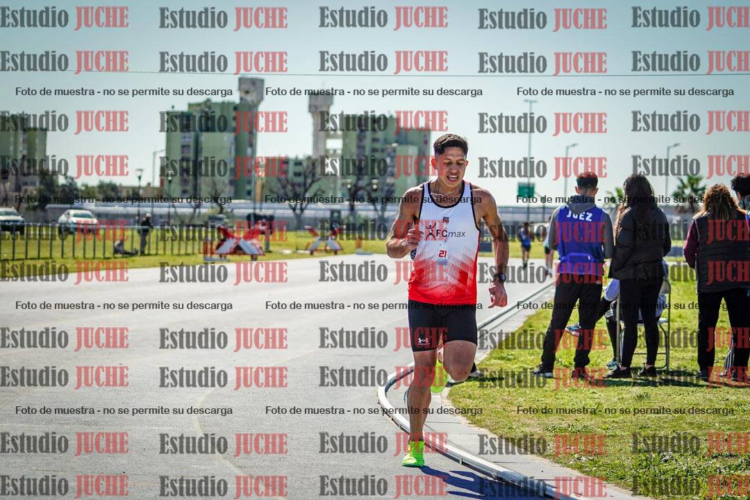 Fotos de los 5000 m llanos de mujeres y varones