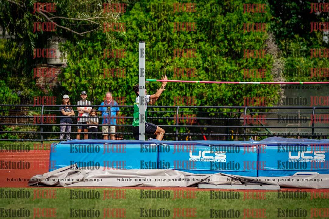 Fotos del salto en alto de mujeres y varones